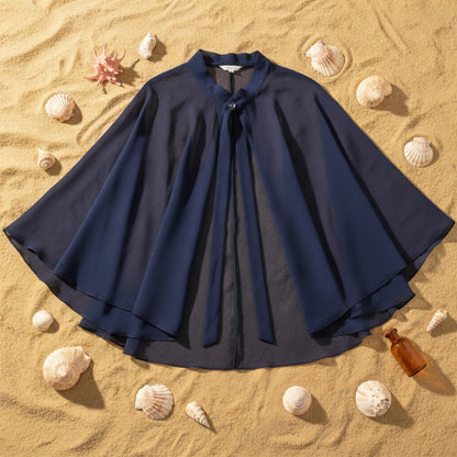 Navy blue chiffon poncho cape flat lay with seashells