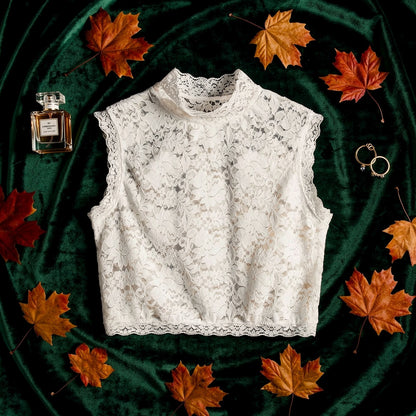 White floral lace crop top with autumn leaves background