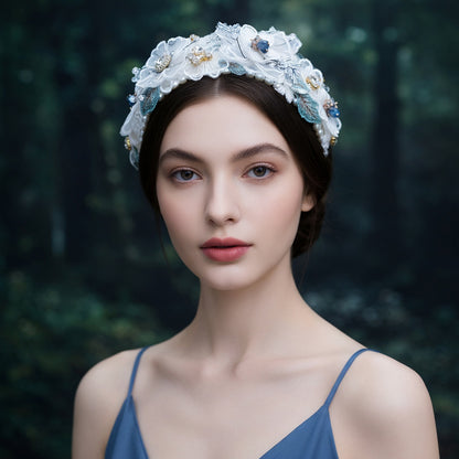 Woman wearing white floral lace headband in forest
