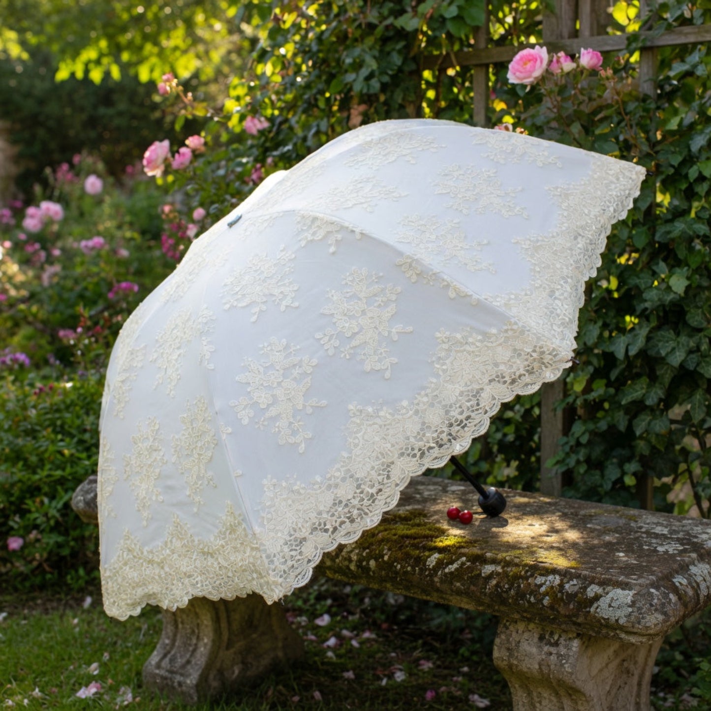 White lace embroidery umbrella in garden with roses