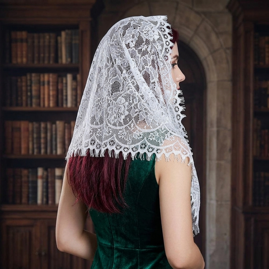Woman wearing black lace mantilla veil in library