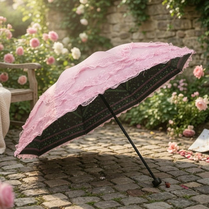 Pink and black lace ruffle parasol on garden path