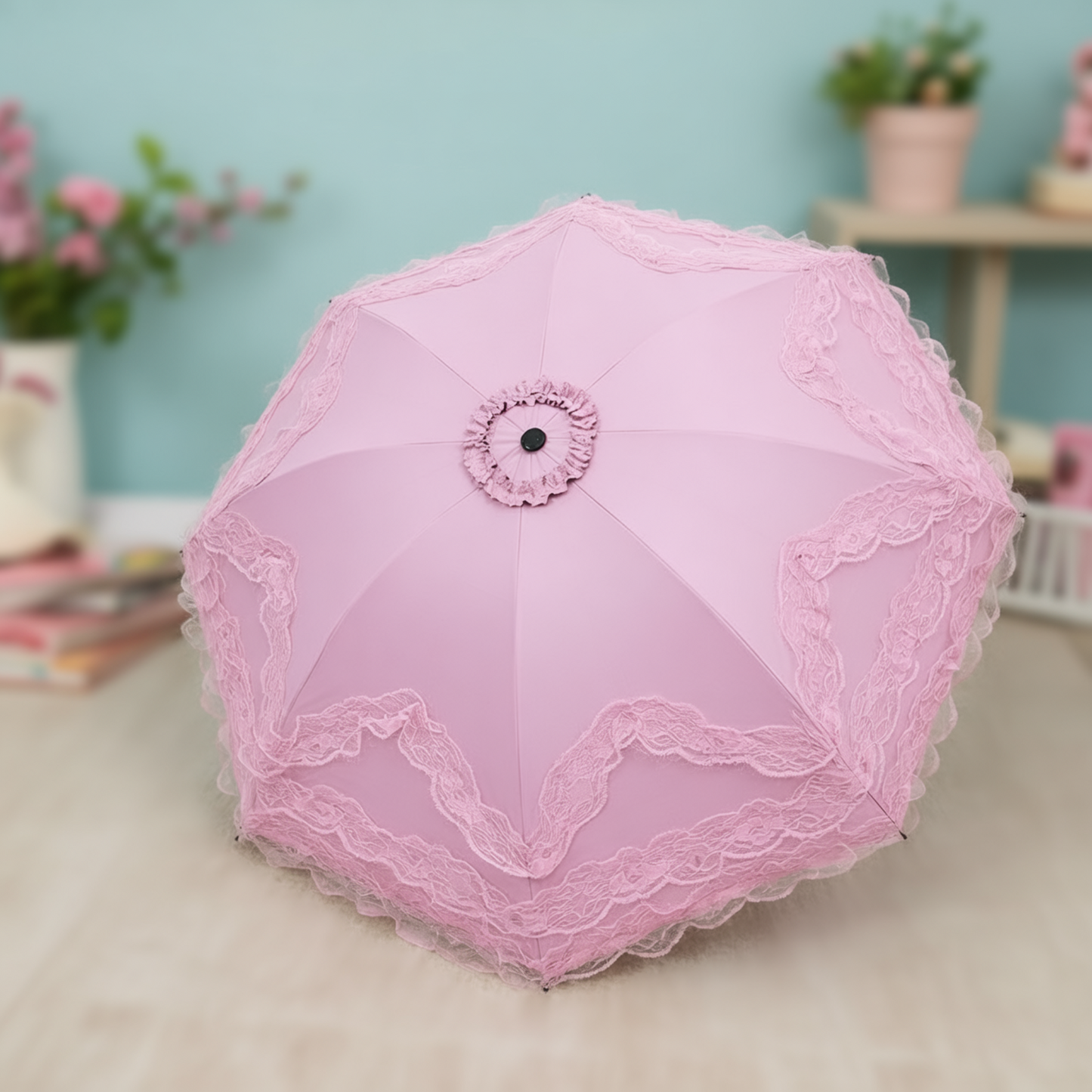 Pastel pink lace ruffle parasol open, top view
