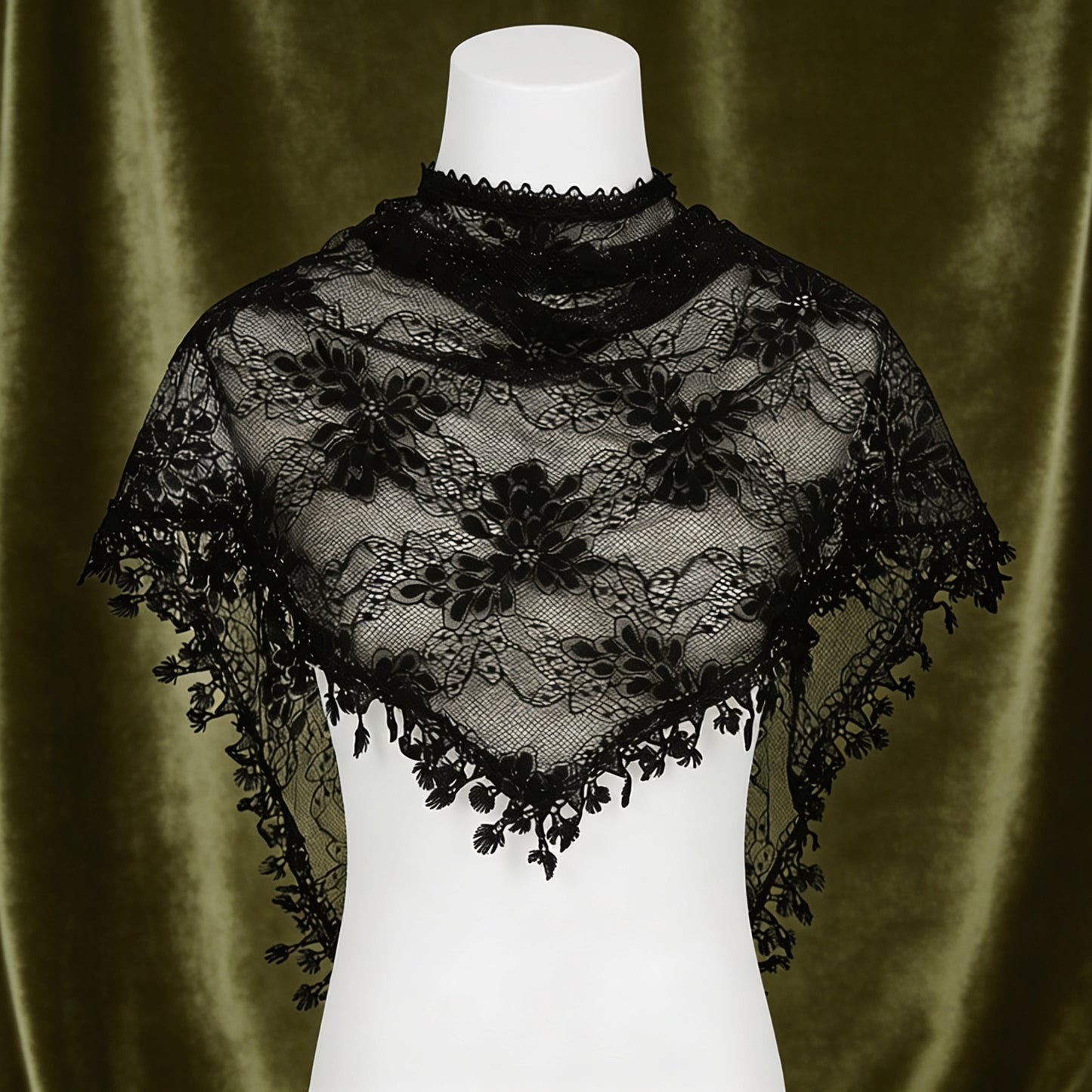 Black lace triangle scarf on mannequin with olive background