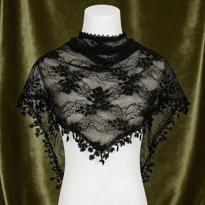 Black lace triangle scarf on mannequin with olive background