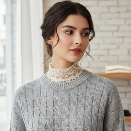 Woman wearing black lace Peter Pan collar with gray turtleneck
