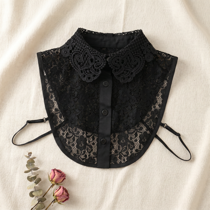 Black lace Peter Pan collar flat lay on linen with dried flowers