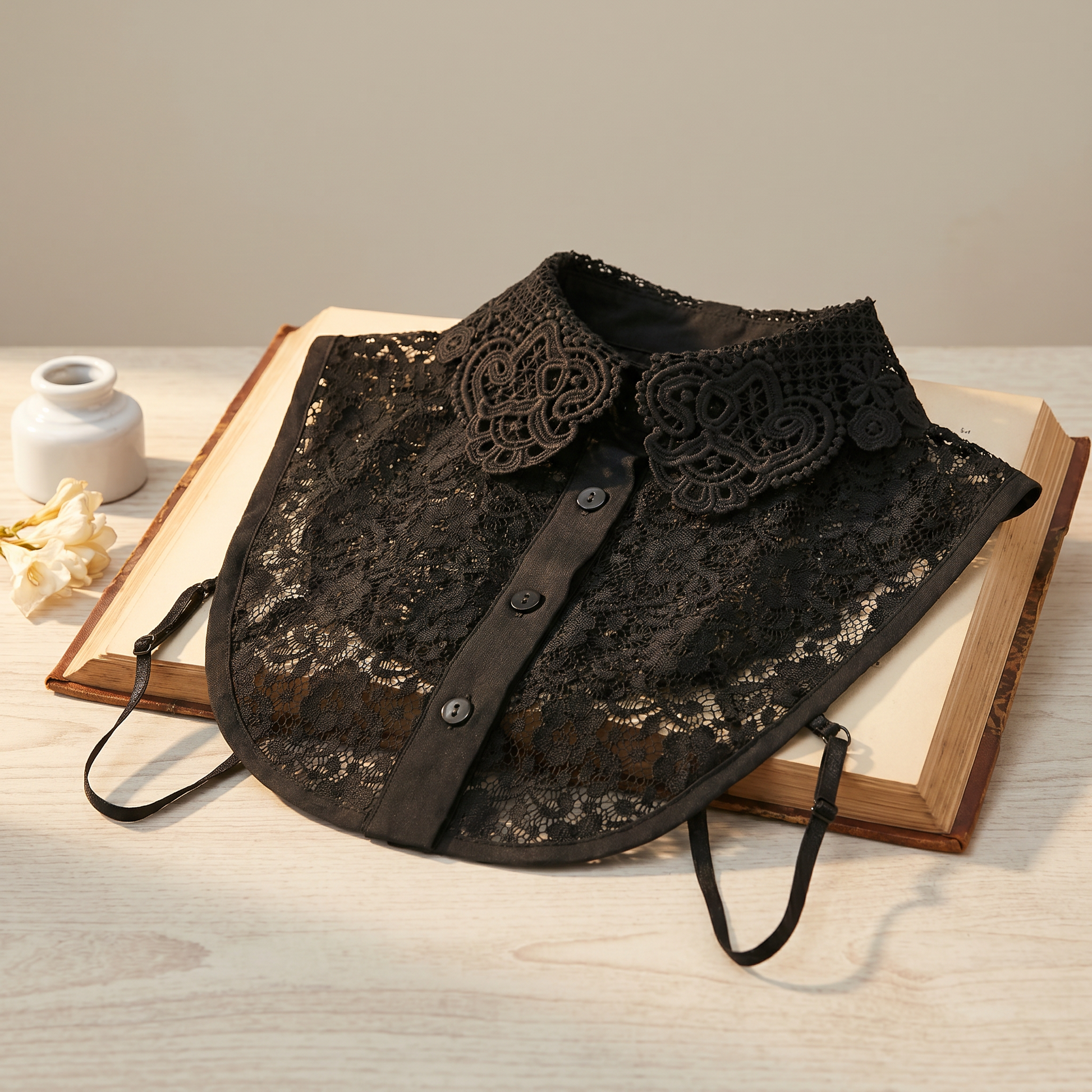 Black lace Peter Pan collar on wooden tray
