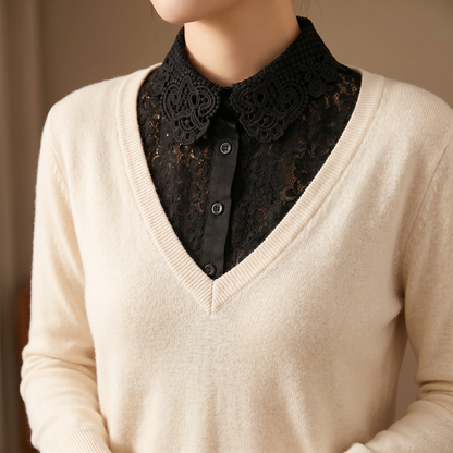 Woman wearing white lace Peter Pan collar with beige sweater