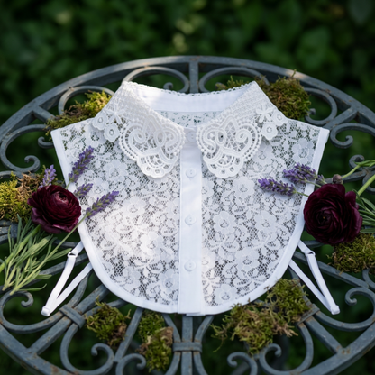 Woman wearing white lace Peter Pan collar in garden with lavender