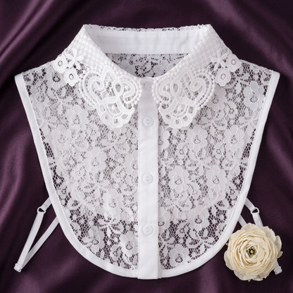 White lace Peter Pan collar flat lay on purple velvet fabric