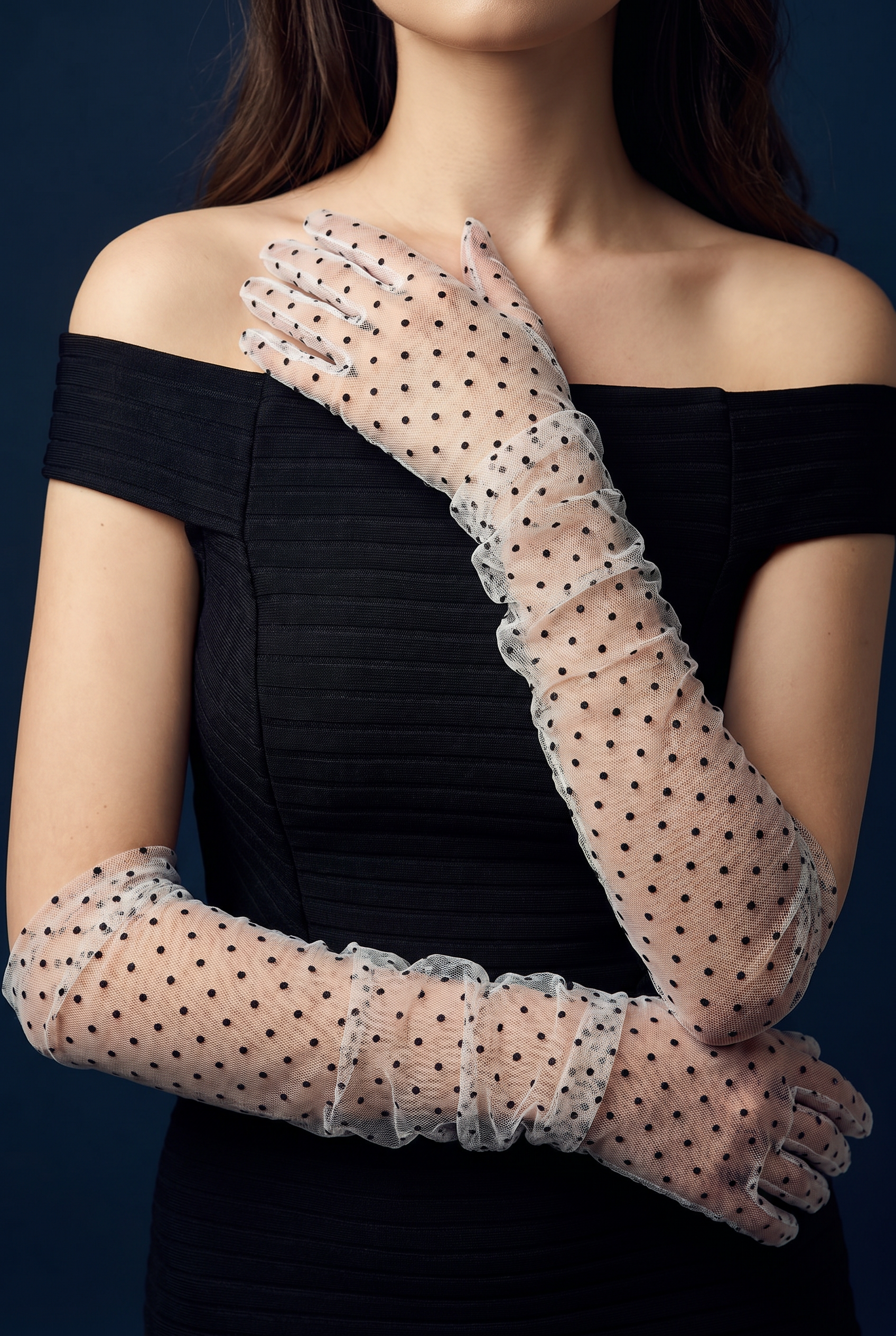 Black polka dot lace gloves worn with off-shoulder evening dress